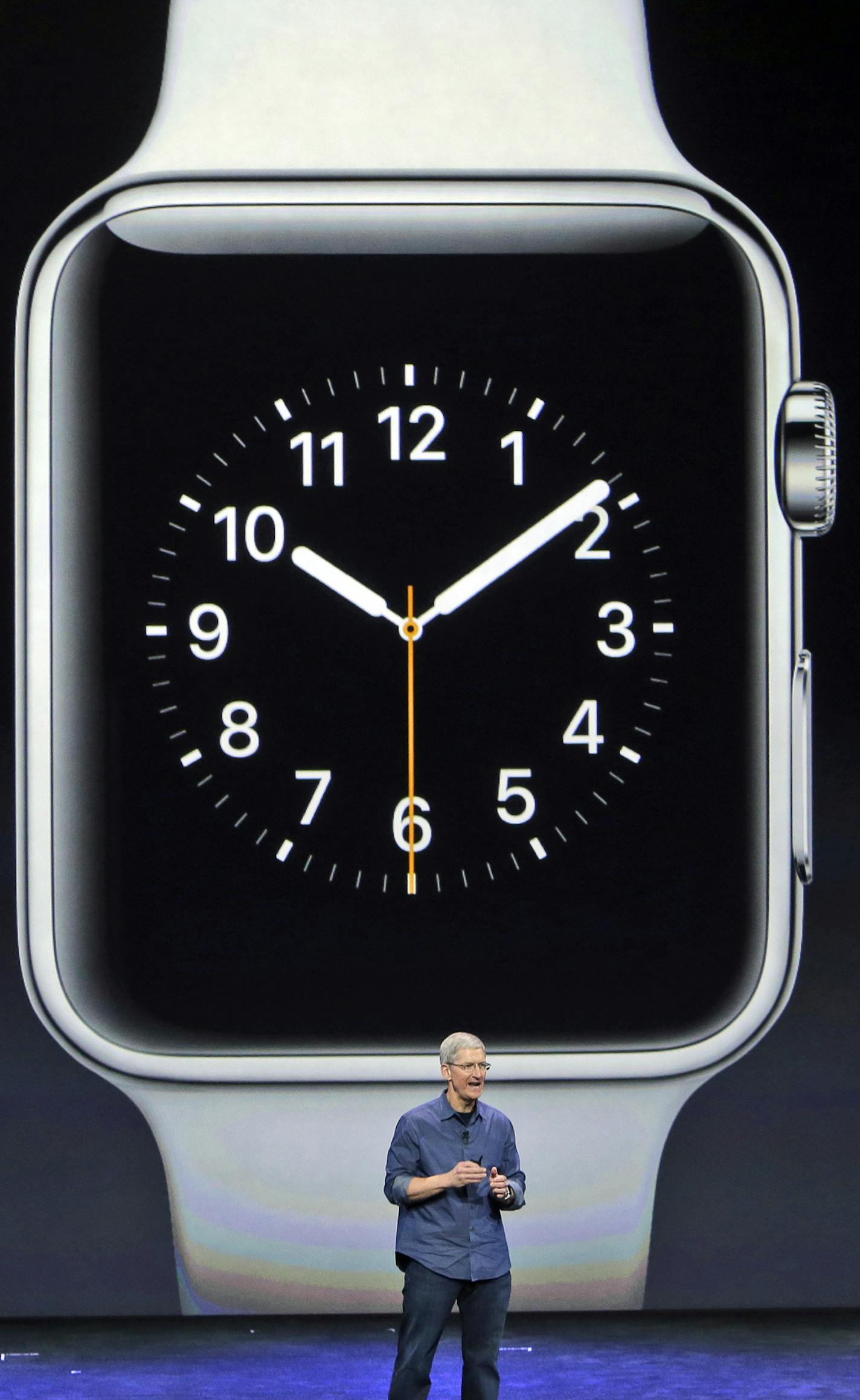 Apple CEO Tim Cook introduces the new Apple Watch on Tuesday, Sept. 9, 2014, in Cupertino, Calif. (AP Photo/Marcio Jose Sanchez)