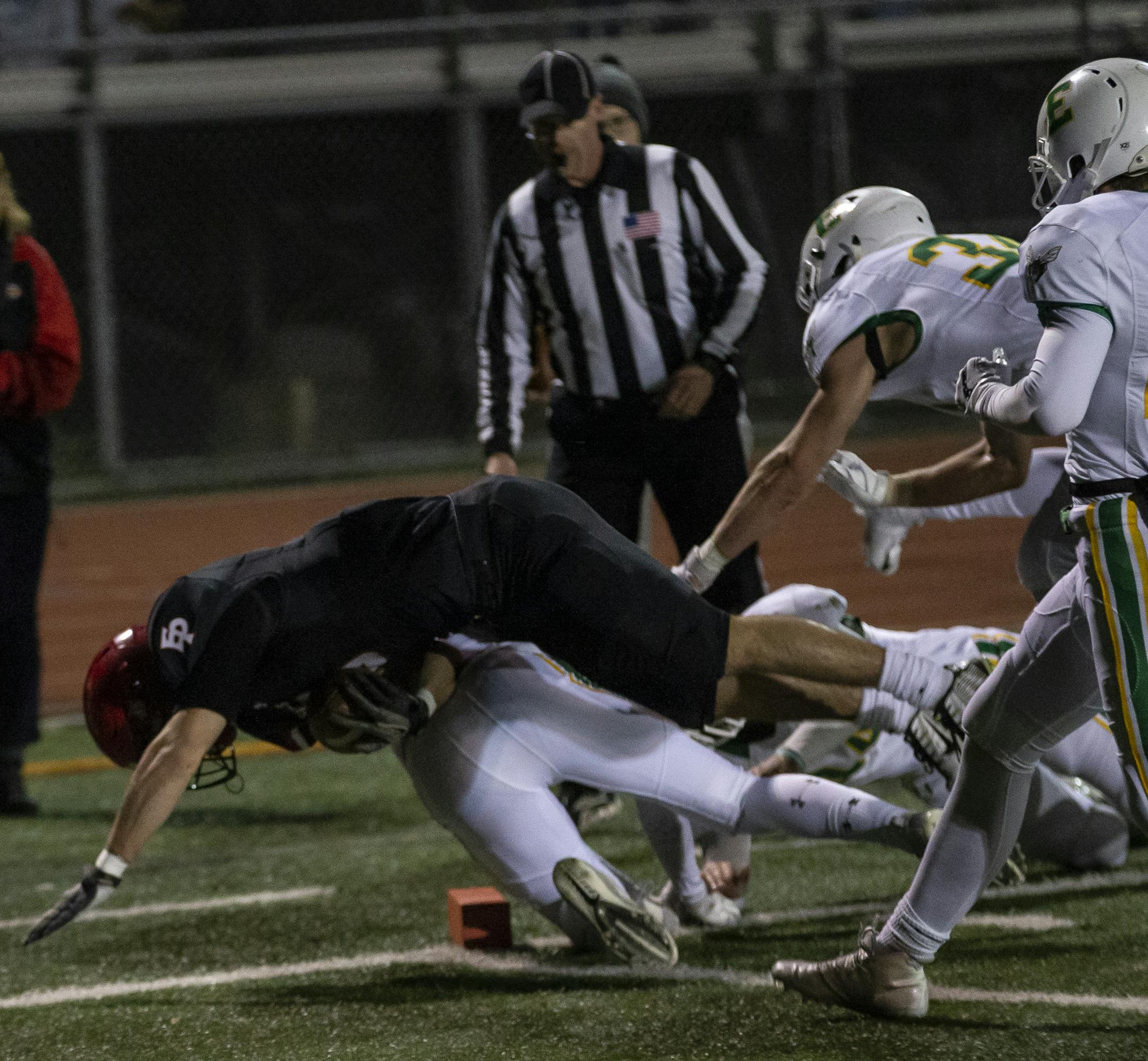Eden Prairie linebacker Collin Penn (5) dove into the endzone for a touchdown in the second quarter. ] RENEE JONES SCHNEIDER • renee.jones@startribune.com Eden Prairie Hosted Edina for the last regular season game at Eden Prairie High School in Eden Prairie, Minn., on Wednesday, October 17, 2018.