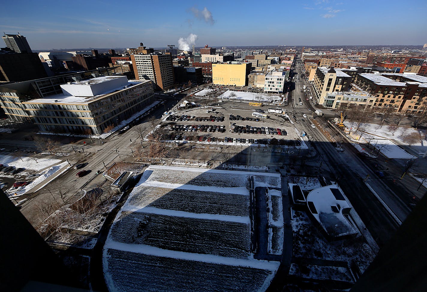 The proposed Nicollet Hotel Block is adjacent to the downtown Minneapolis Library (middle left). ] JIM GEHRZ &#x201a;&#xc4;&#xa2; james.gehrz@startribune.com / Minneapolis, MN / February 6, 2015 /10:30 AM &#x201a;&#xc4;&#xec; BACKGROUND INFORMATION: City planners recommend United Properties to develop Nicollet Hotel Block. Betsy Hodges, Frank Dutke, President and CEO of United Properties, city council members, etc. announce Nicollet Hotel Block tower project.