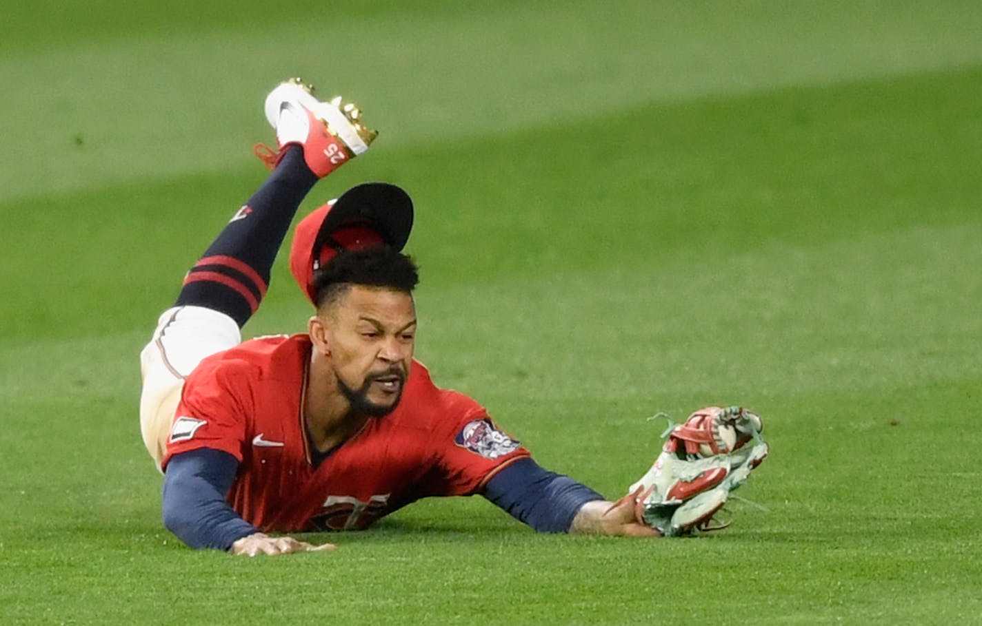 Byron Buxton makes a catch in center field Friday night.