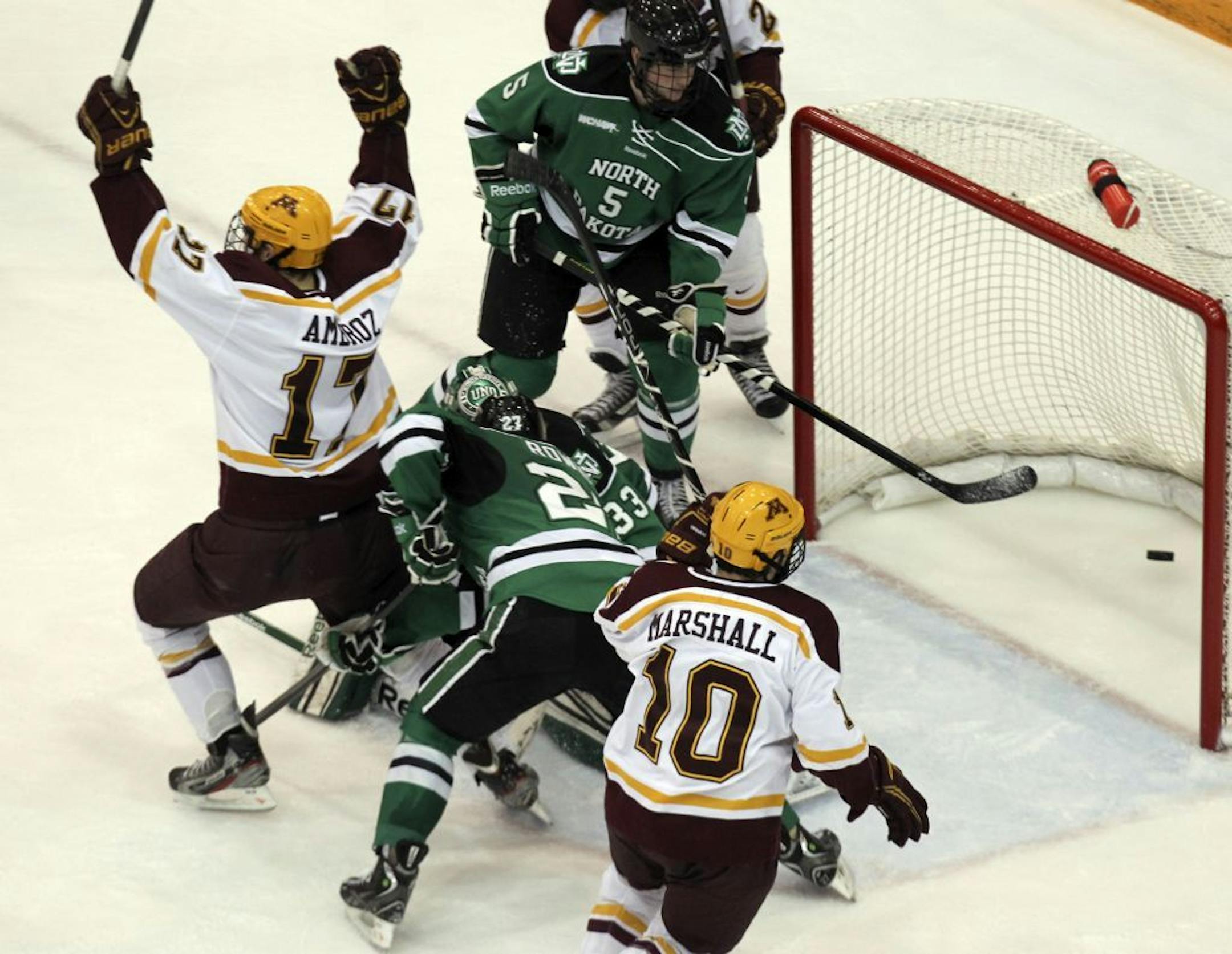 Minnesota's Seth Ambroz (17) celebrates his second-period power-play goal.