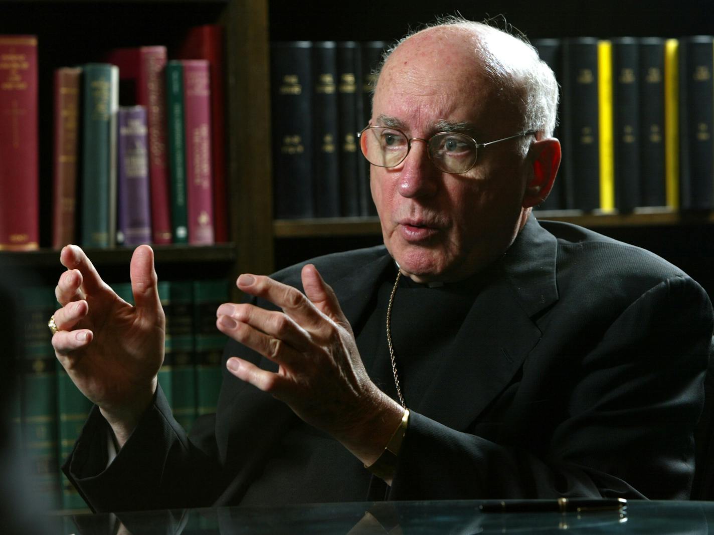 Former Archbishop Harry J. Flynn, pictured in 2003.