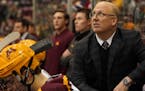 Gophers coach Bob Motzko watched from the bench during a game last month. Minnesota lost Friday night, 3-2 to Notre Dame.