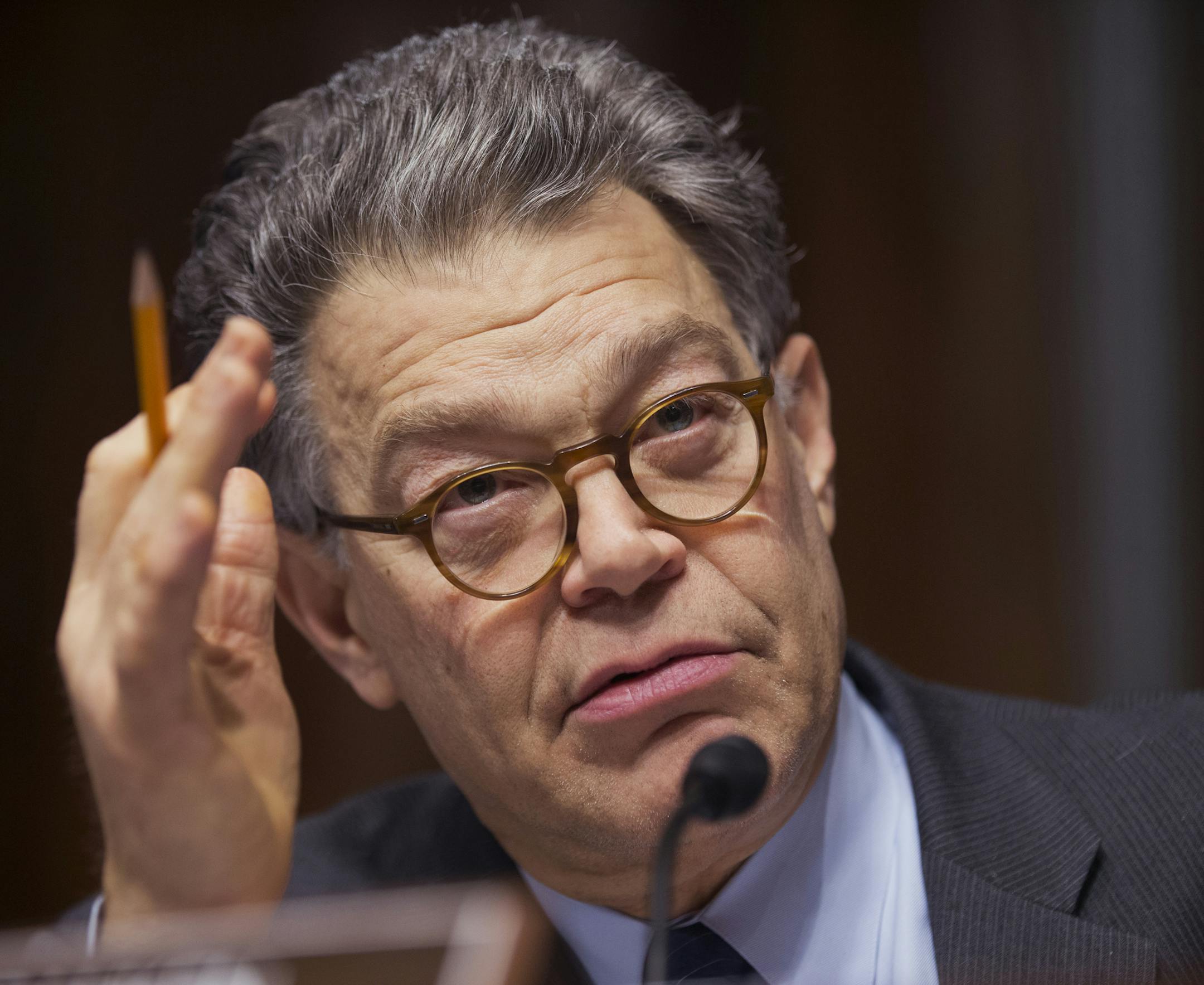 Senate Judiciary Committee member Sen. Al Franken, D-Minn., questions panel of witnesses during the committee's hearing on "Continued Oversight of U.S. Government Surveillance Authorities" Wednesday, Dec. 11, 2013, on Capitol Hill in Washington. (AP Photo/Manuel Balce Ceneta)