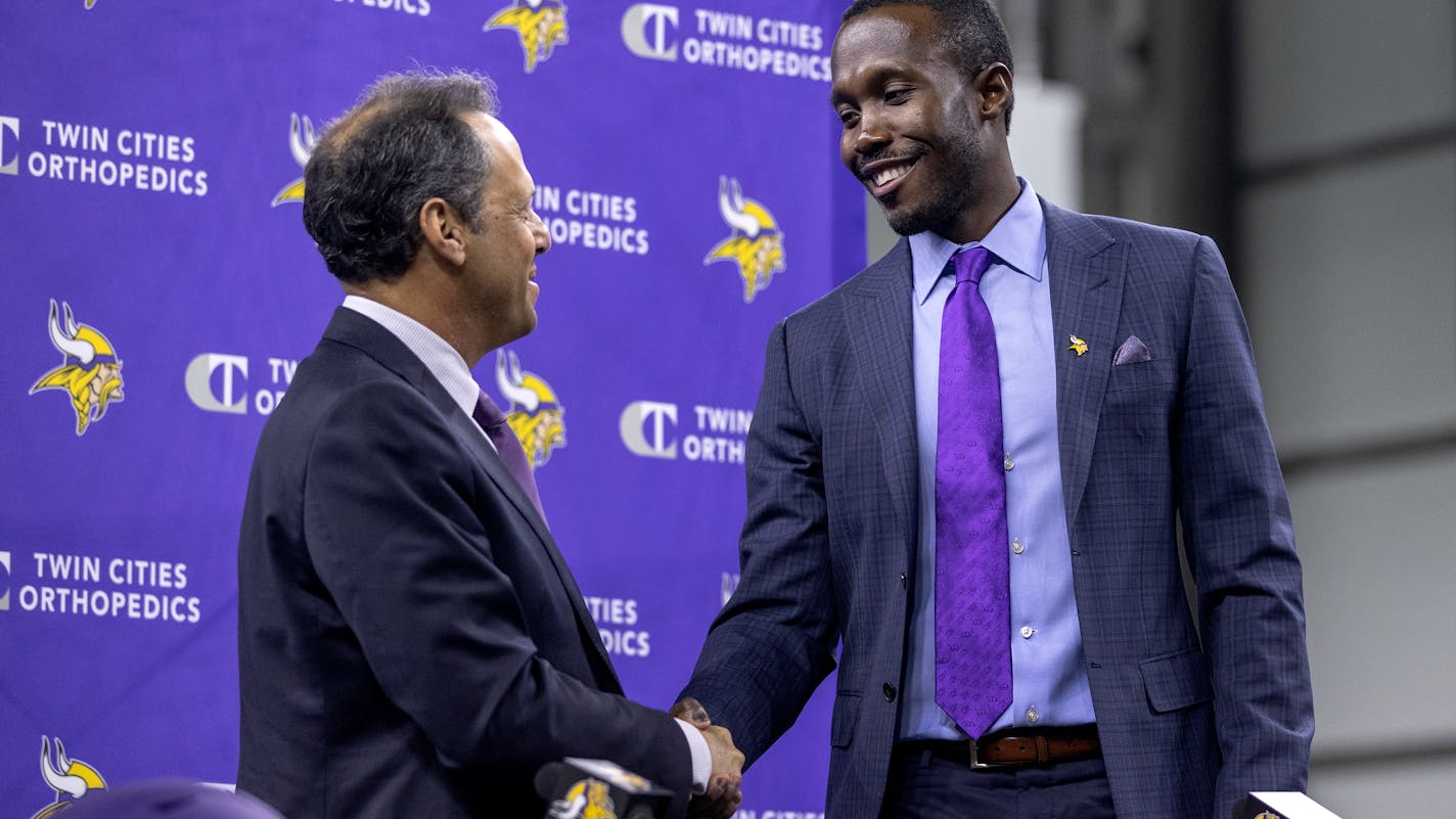 Minnesota Vikings president Mark Wilf and new general manger Kwesi Adofo-Mensah shake hands after a press conference Thursday, Jan. 27, at TCO Performance Center in Eagan, Minn. ] CARLOS GONZALEZ • cgonzalez@startribune.com