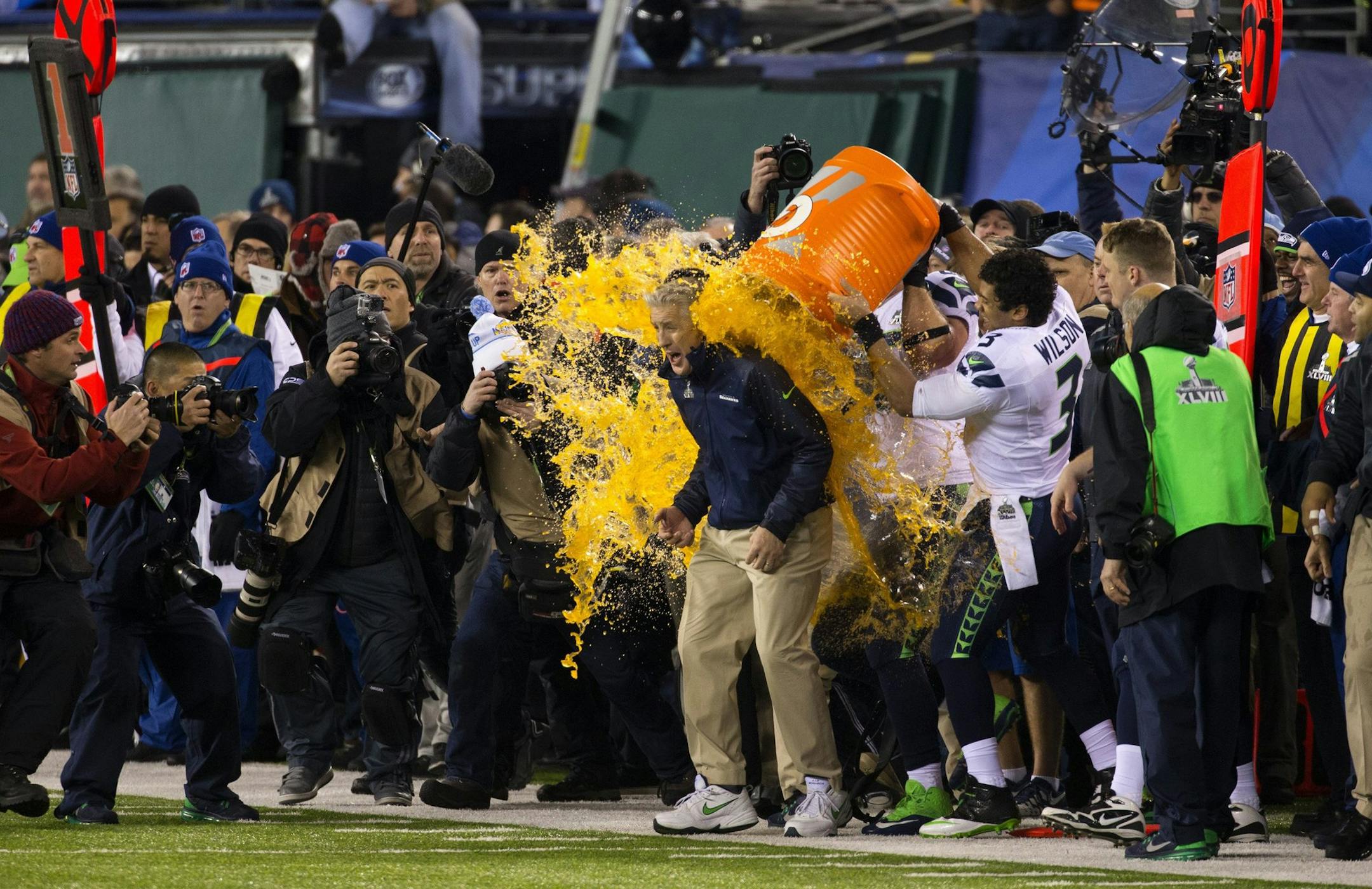Seattle Seahawks players dump Gatorade on head coach Pete Carroll at the conclusion of a 43-8 win against the Denver Broncos in Super Bowl XLVIII at MetLife Stadium in East Rutherford, N.J., on Sunday, Feb. 2, 2014. (Mike Siegel/Seattle Times/MCT)