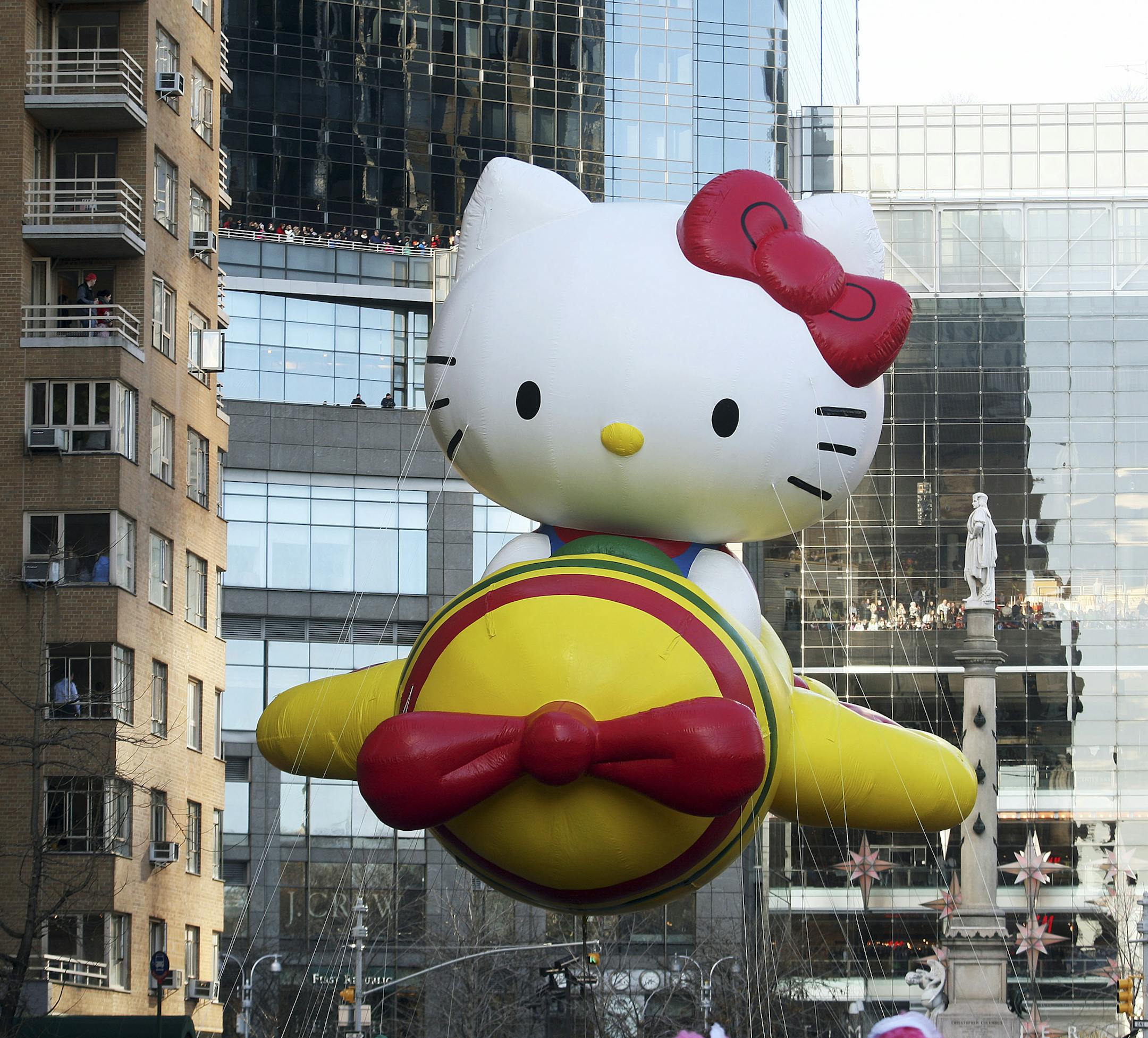 ** PHOTO MOVED IN ADVANCE AND NOT FOR USE - ONLINE OR IN PRINT - BEFORE NOV. 16, 2014.**
FILE — A Hello Kitty float passes near Columbus Circle during the Macy’s Thanksgiving Day Parade, in New York, Nov. 28, 2013. A stay in one of the hotels along the parade route offers an extraordinary view of the floats, but the rooms don’t come cheap. (Hiroko Masuike/The New York Times)