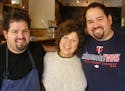 Mom Lupe hugs chef sons Mike Brown, left, and Matt Brown, right. Mike helped Matt cook after Matt's daughter got cancer.
