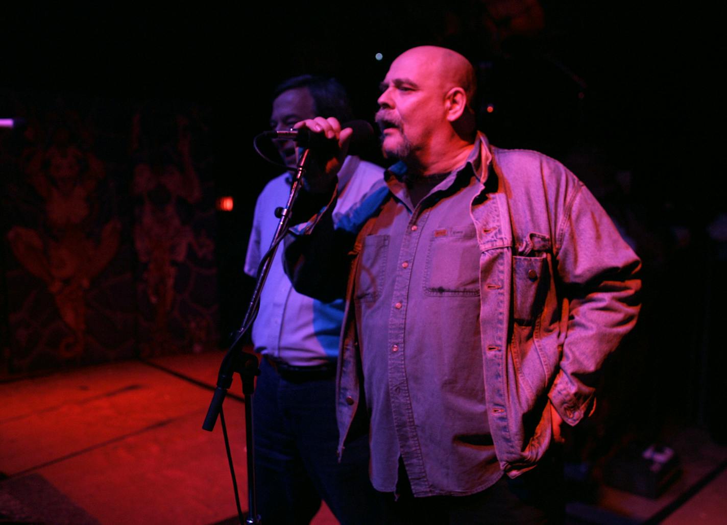 Staff photo by Jeff Wheeler
MINNEAPOLIS - 11/19/04 - First Ave., the legendary Minneapolis music venue, reopened Friday night after emerging from bankruptcy court with its former managers as the new owners
IN THIS PHOTO: New First Ave. owner Steve McClellan thanked the crowd for coming to the reopened club just before the headliner, GWAR, hit the stage Friday night.