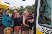 Janet Hedy, of Willmar, Minn., was the first passenger to board a State Fair express bus at the County Road 73 Park and Ride in Minnetonka on Thursday