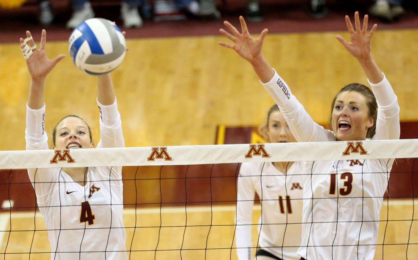 The University of Minnesota's Paige Tapp (4) and Molly Lohman (13) go up to block a shot during the second set of their match with the University of North Dakota in the first round of the NCAA volleyball tournament at the Sports Pavilion on the University of Minnesota campus Friday, Dec. 2, 2016, in Minneapolis, MN.] (DAVID JOLES/STARTRIBUNE)djoles@startribune.com NCAA volleyball tournament coverage