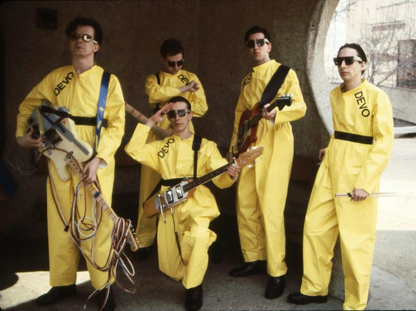 In this 1978 photo taken by Janet Macoska and released by Devo, Inc., the band Devo, from left, Mark Mothersbaugh, Bob Mothersbaugh, kneeling, Jerry Casale, Bob Casale and Alan Myers pose for a photo. Devo spokesman Michael Pilmer confirmed Wednesday, June 26, 2013, that drummer Alan Myers died Monday, June 24, after a battle with brain cancer in Los Angeles. He was 58. (AP Photo/Devo Inc., Janet Macoska) MANDATORY CREDIT