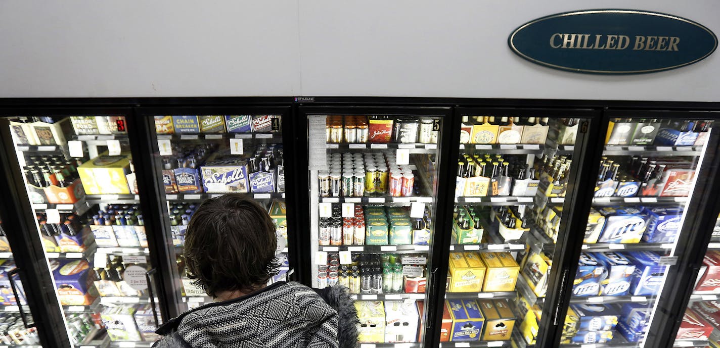 Christopher Hunt, 32, of Minneapolis shopped for beer at Surdyk's in Northeast Minneapolis.