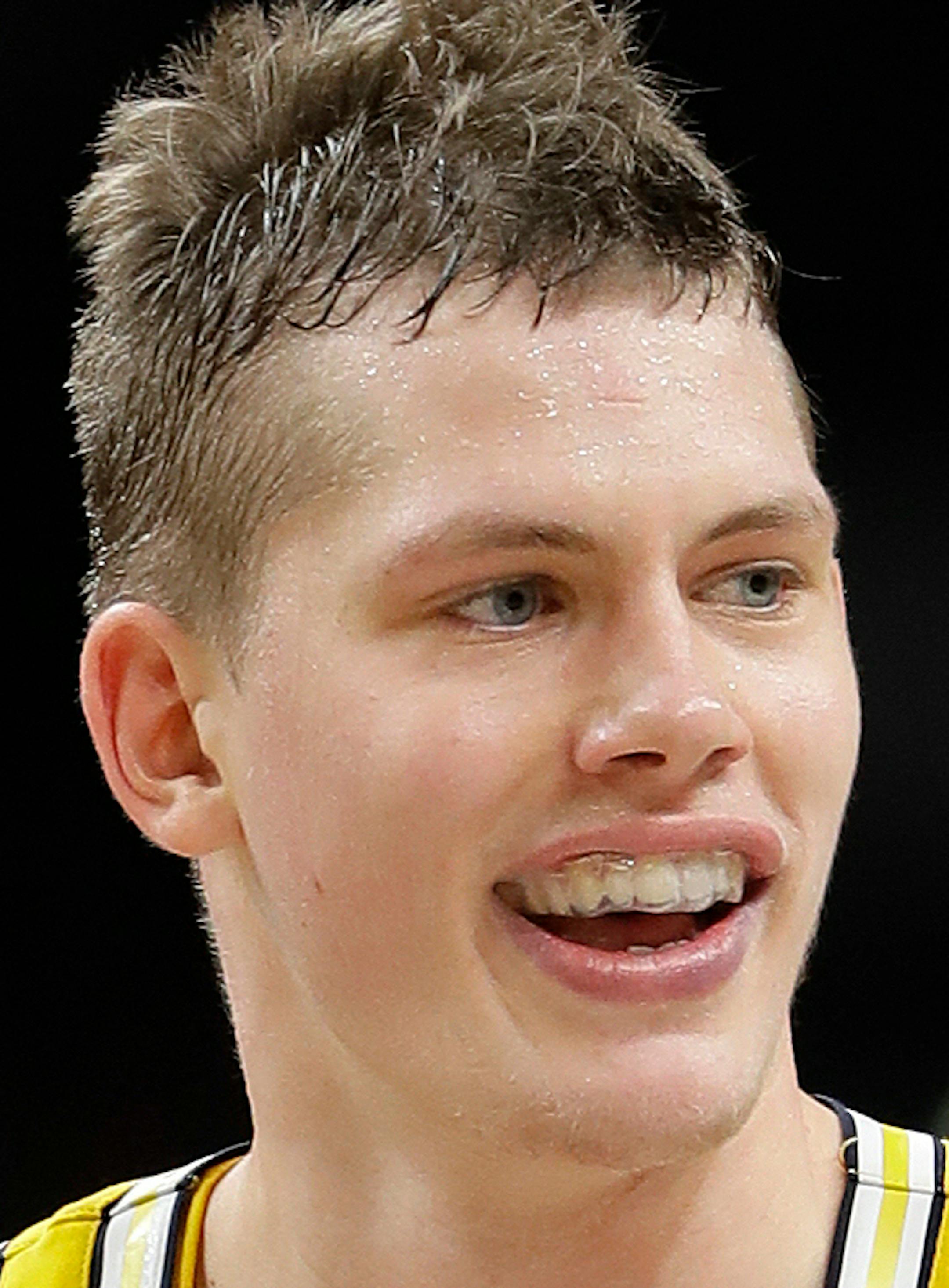 Michigan's Moritz Wagner (13) celebrates during the second half in the semifinals of the Final Four NCAA college basketball tournament against Loyola-Chicago, Saturday, March 31, 2018, in San Antonio. (AP Photo/Eric Gay)