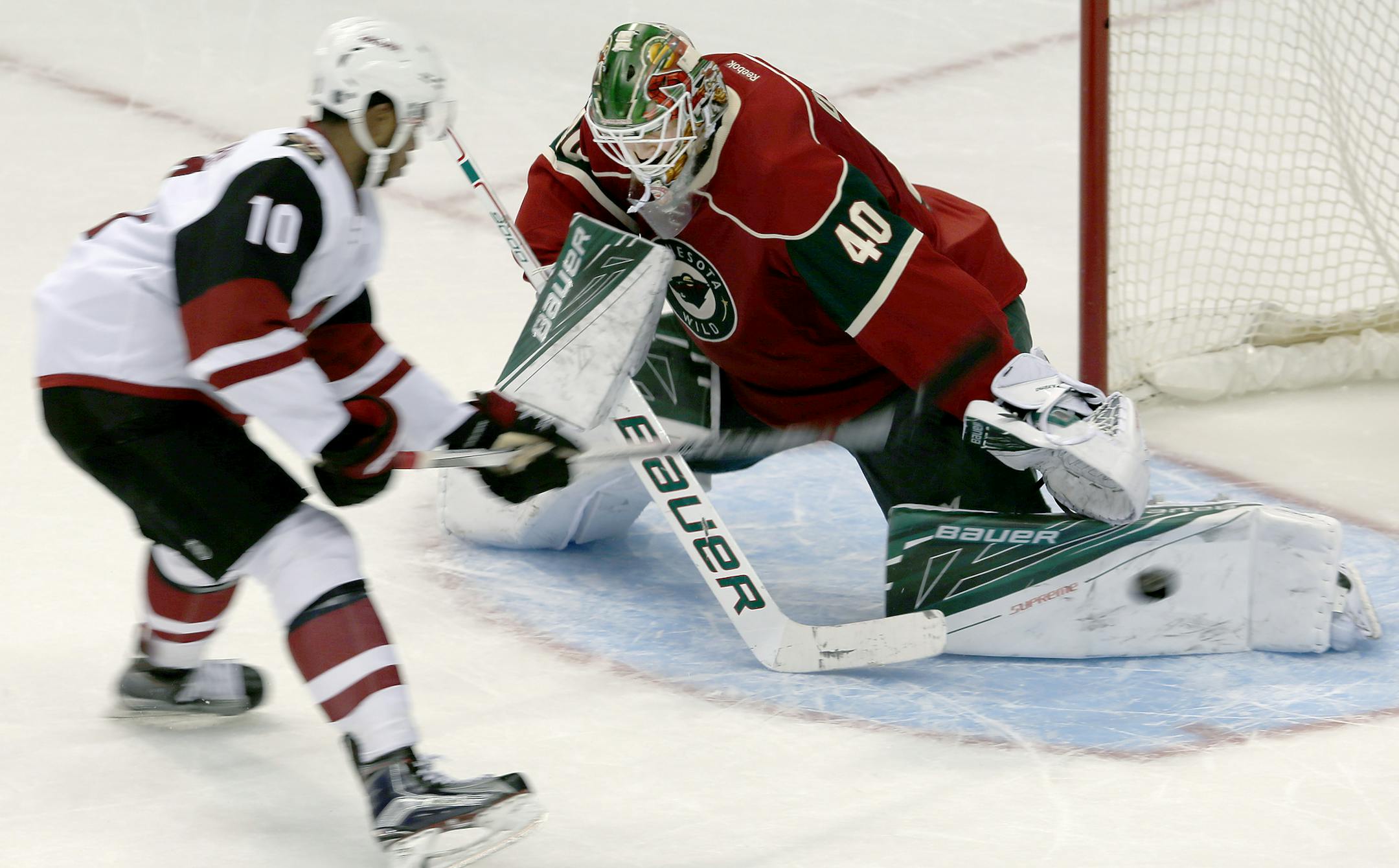 Anthony Duclair (10) got the puck past Wild goalie Devan Dubnyk (40) for a goal during the overtime shootout. Arizona beat Minnesota 2-1 in shootout. ] CARLOS GONZALEZ ï cgonzalez@startribune.com - January 25, 2016, St. Paul, MN, Xcel Energy Center, NHL, Hockey, Minnesota Wild vs. Arizona Coyotes