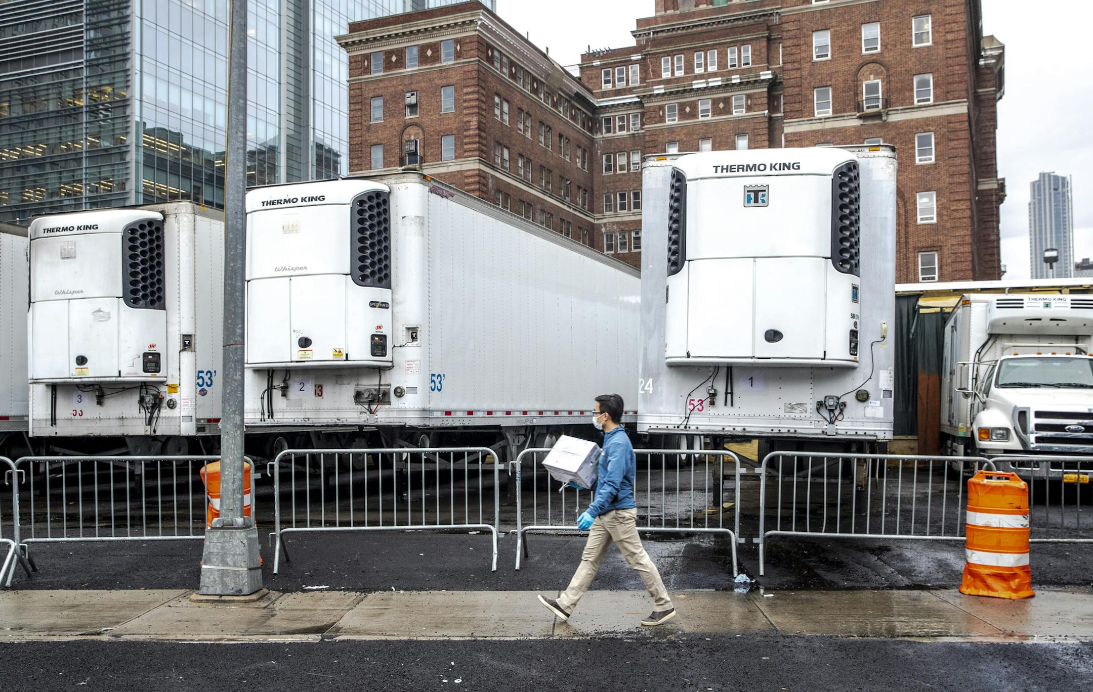FILE -- A temporary morgue outside the medical examiner's office in New York, April 9, 2020. This spring, death rates rivaled those seen during the countryÕs deadliest pandemic, a new study finds. (Brittainy Newman/The New York Times)