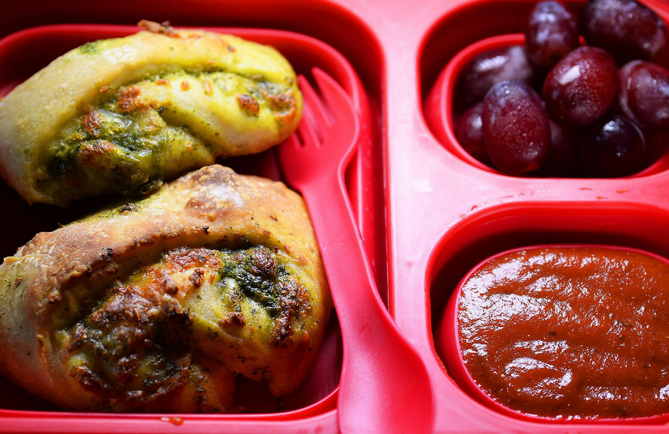 Spinach Pesto Pizza Rollups can be served cold with a little pizza dipping sauce. (Diedra Laird/Charlotte Observer/TNS) ORG XMIT: 1189009