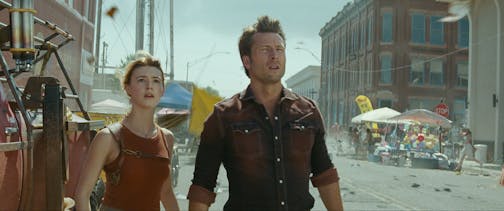Glen Powell and Daisy Edgar-Jones in  "Twisters." (Universal Pictures via AP)