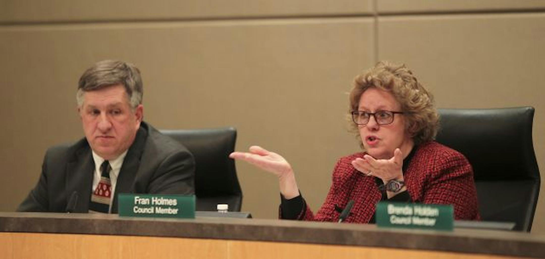 Fran Holmes, Arden Hills City Council member, explained her support for the stadium resolution before the council Monday night. At left was Mayor David Grant.
