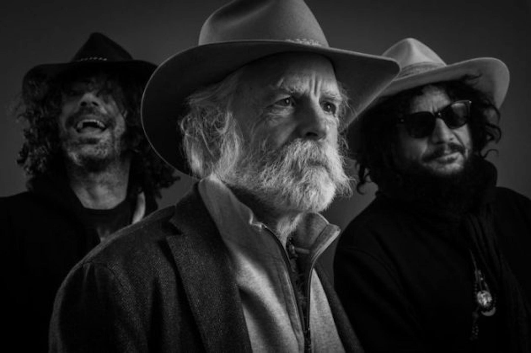 Bob Weir, center, may look like a sheriff from a Wyoming cattle county in this photo, but he's still rocking out with the hippies.