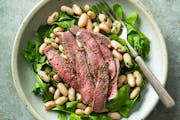 Flank steak can stand up to the tangiest of marinades. Grilled Flank Steak with Worcestershire Marinade recipe by Beth Dooley, photo by Mette Nielsen,