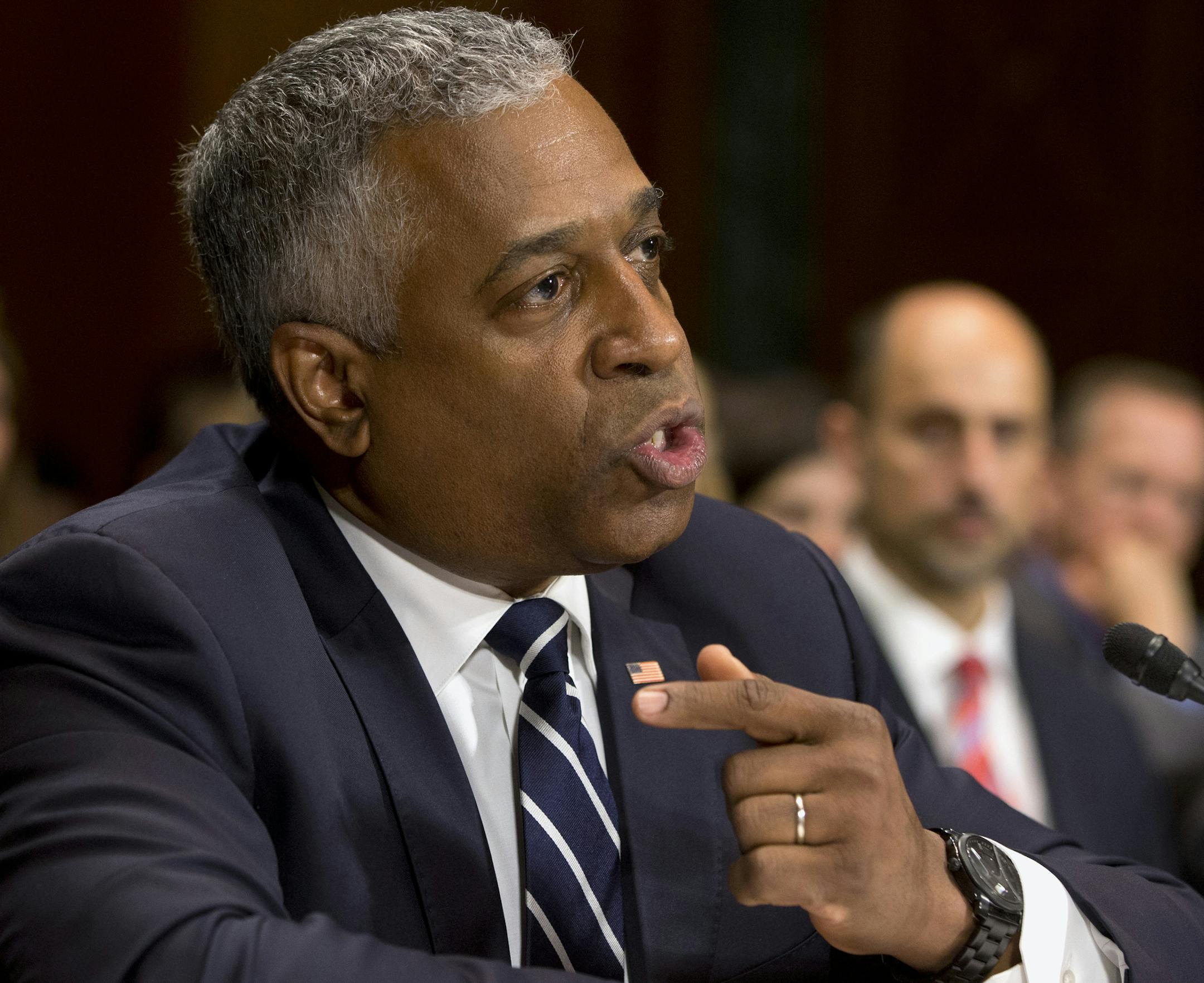FILE - In this June 11, 2013 file photo, B. Todd Jones of Minnesota, President Barack Obama's then-nominee for director of the Bureau of Alcohol, Tobacco, Firearms and Explosives testifies on Capitol Hill in Washington. The first Senate-confirmed director for the Bureau of Alcohol, Tobacco, Firearms and Explosives is leaving the post after less than two years as its permanent head. B. Todd Jonesí last day will be March 31, the agency says. (AP Photo/Jacquelyn Martin)