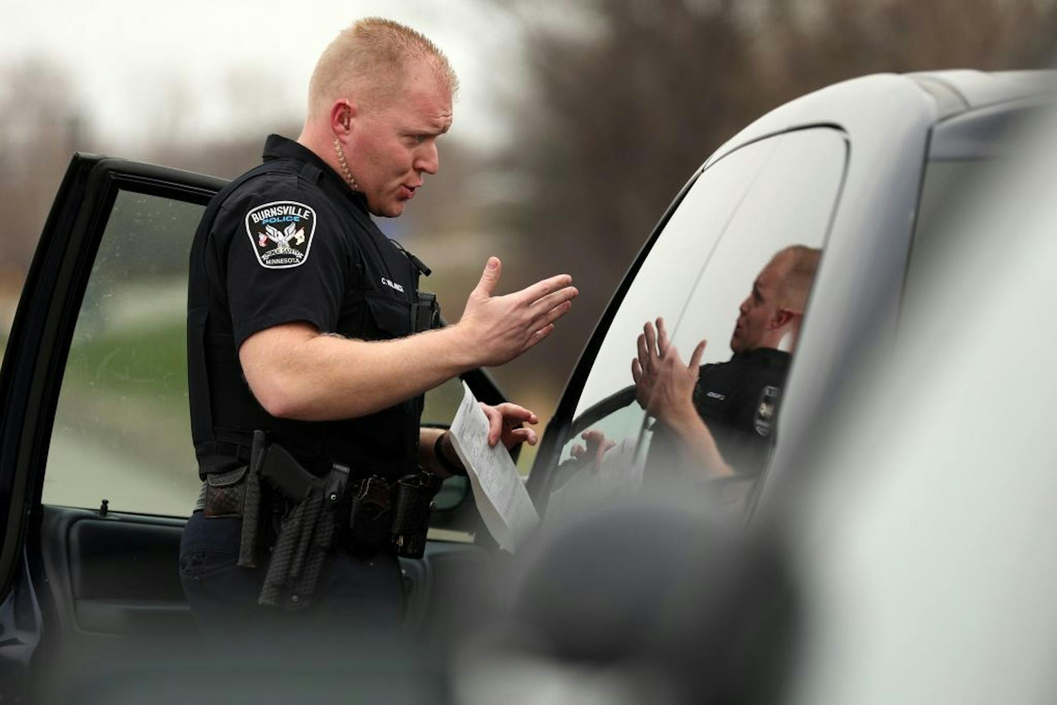 Officer Chris Walswick with the Burnsville Police Department talked with a driver during a traffic stop in 2017.