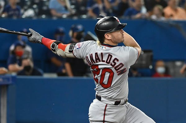 Josh Donaldson follows through on a solo home run against the Blue Jays during the third inning Friday.