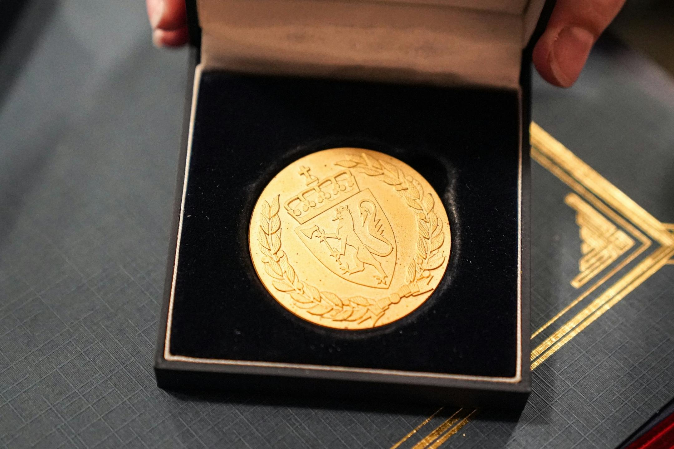 Norwegian Ambassador Kåre R. Aas presented two medals to 100-year-old Wilton Rasmusson, who served under the Office of Strategic Services' Norwegian Operational Unit, NORSO II, during World War II.