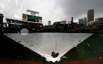 A tarp covered the infield at Target Field