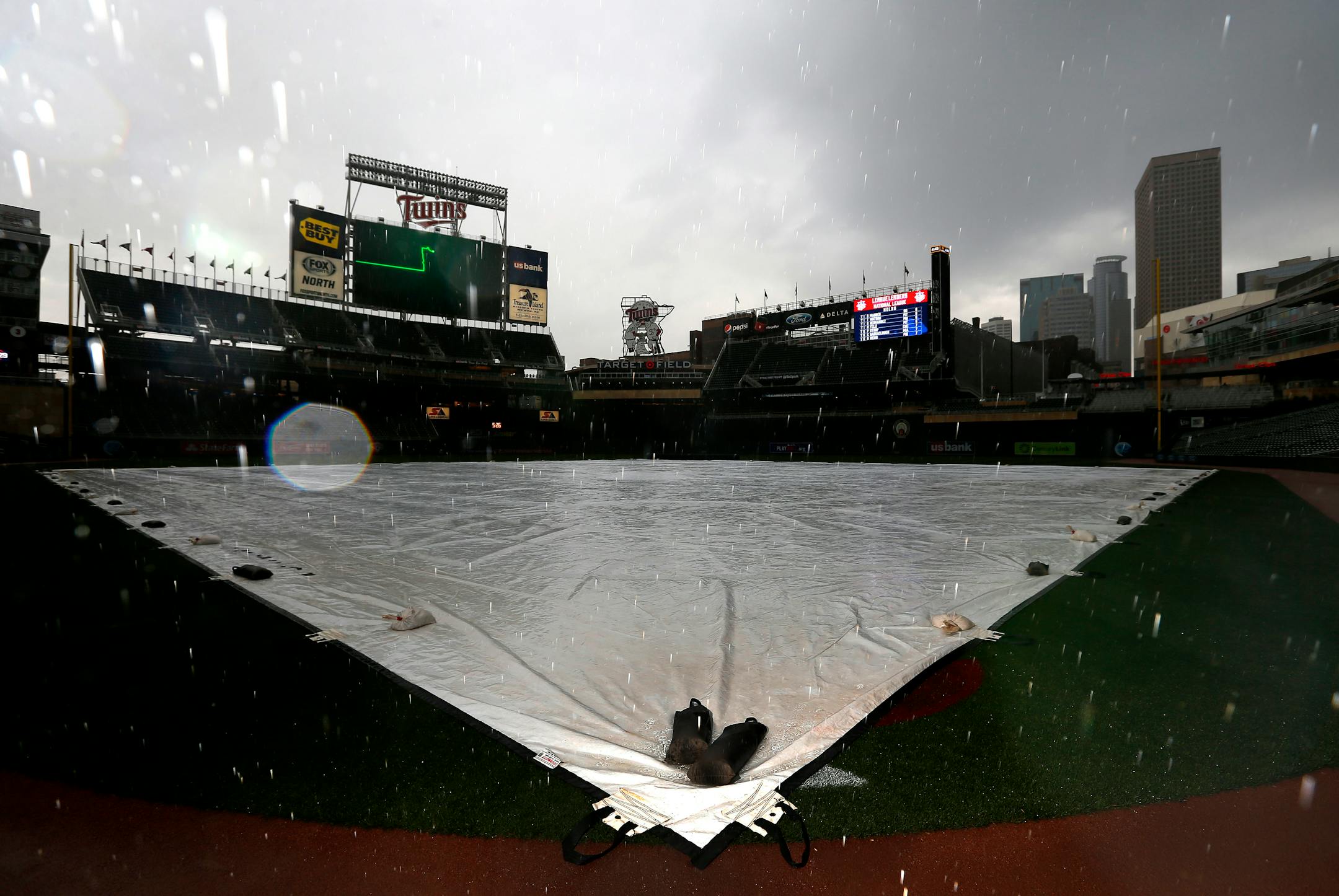 A tarp covered the infield at Target Field