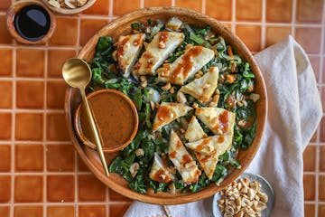 Pan-roasted Tofu with Dark Greens and Spicy Peanut Vinaigrette featuring fresh tofu.