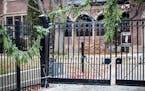 The damaged gate of the Governor's Mansion after an SUV rammed into it.