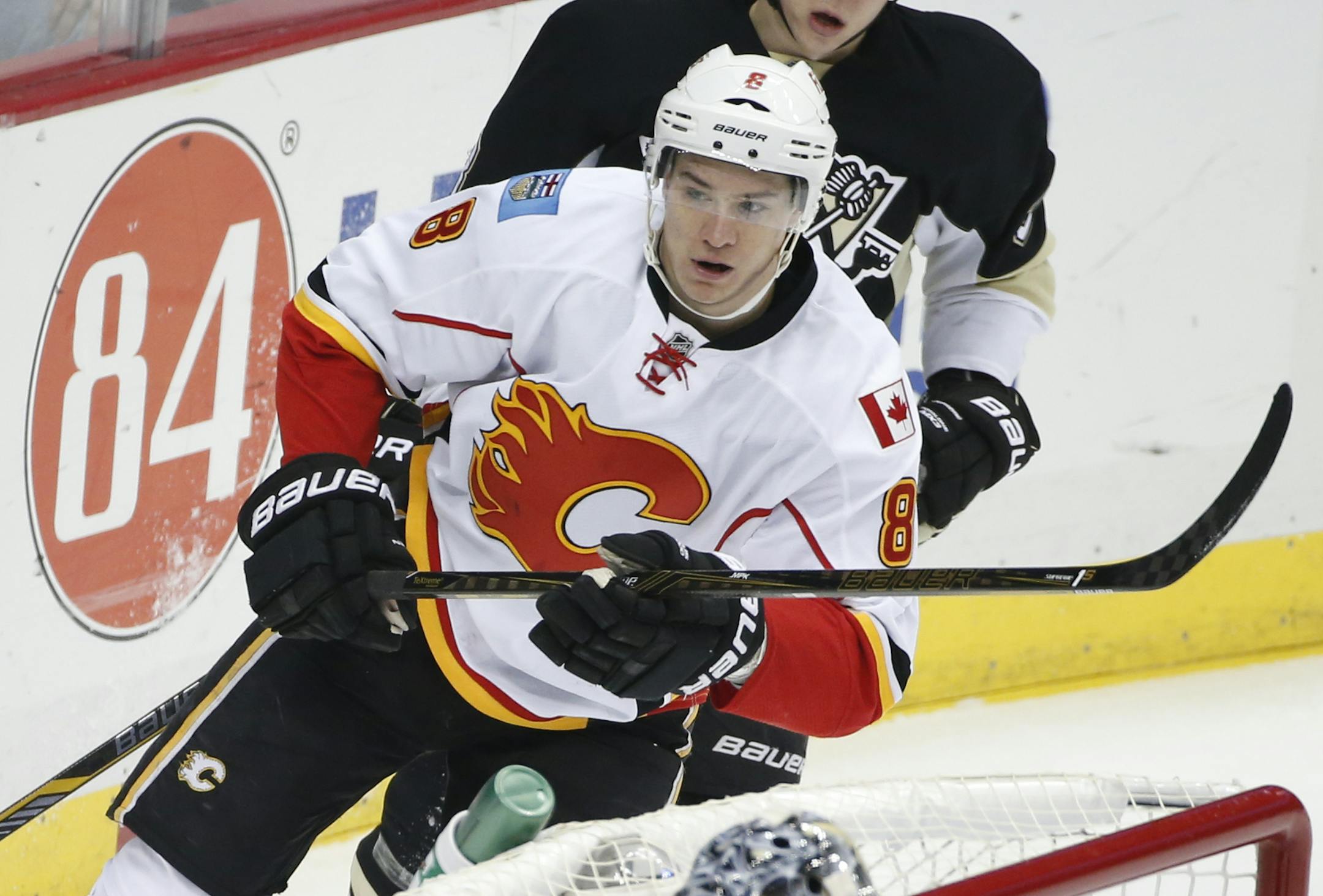 Calgary Flames center Joe Colborne (8) plays in an NHL hockey game against the Pittsburgh Penguins in Pittsburgh, Saturday, March 5, 2016. (AP Photo/Gene J. Puskar) ORG XMIT: PAGP