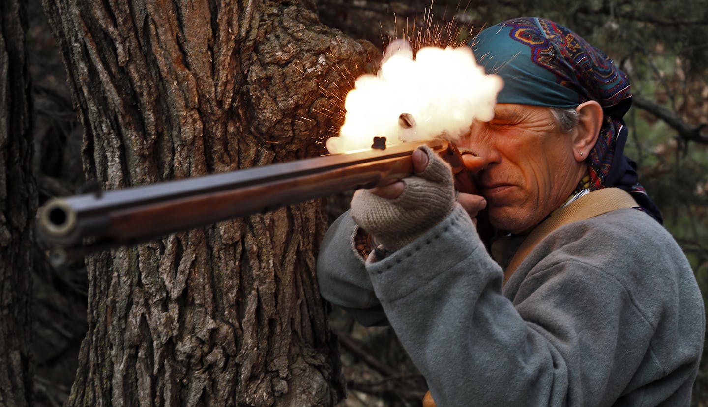 Muzzleloader enthusiast Jim Townsend of Andover firing a model of early 1800's southern mountain rifle. (MARLIN LEVISON/STARTRIBUNE(mlevison@startribune.com)