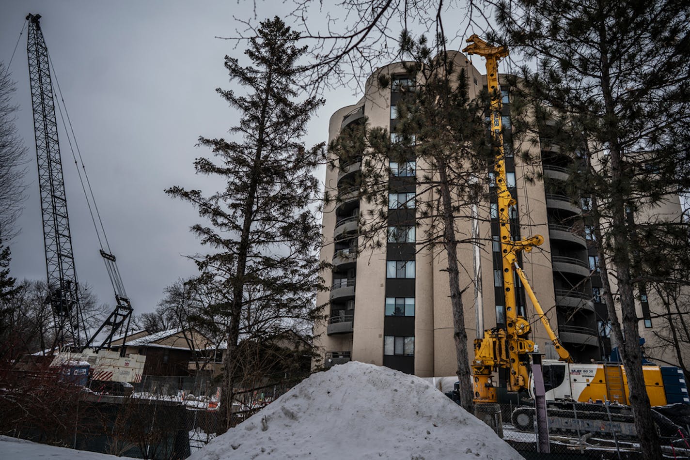 Equipment used in construction of the Southwest light rail near Calhoun Isles condominiums complex in Minneapolis, Minn., on Sunday, Feb. 6, 2022.