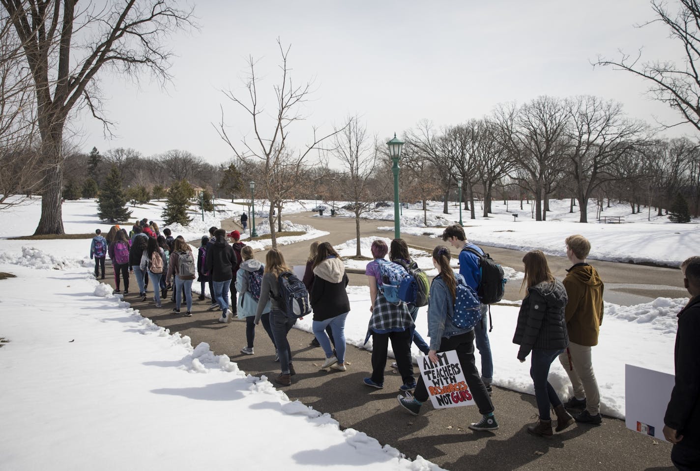 More than 200 Highland Park Senior High students walked to a park for a rally against gun violence during a walkout on the 19th anniversary of the Columbine school shooting on Friday, April 20, 2018 in St. Paul, Minn.