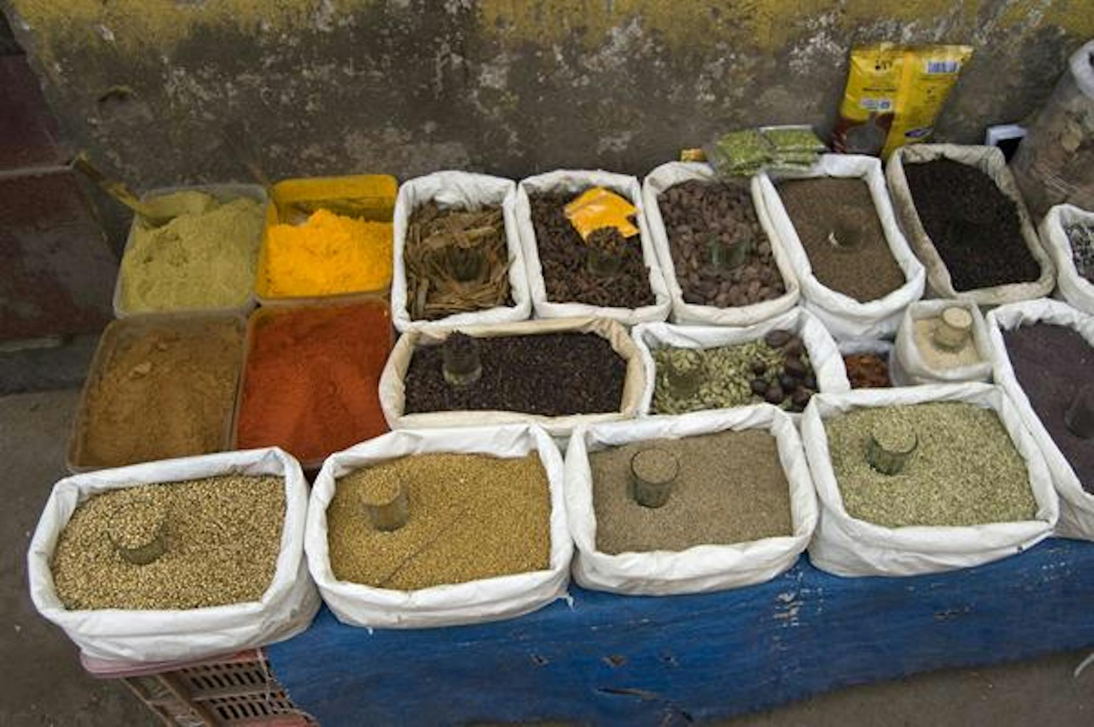 Bags of masala (spices) at an outdoor market