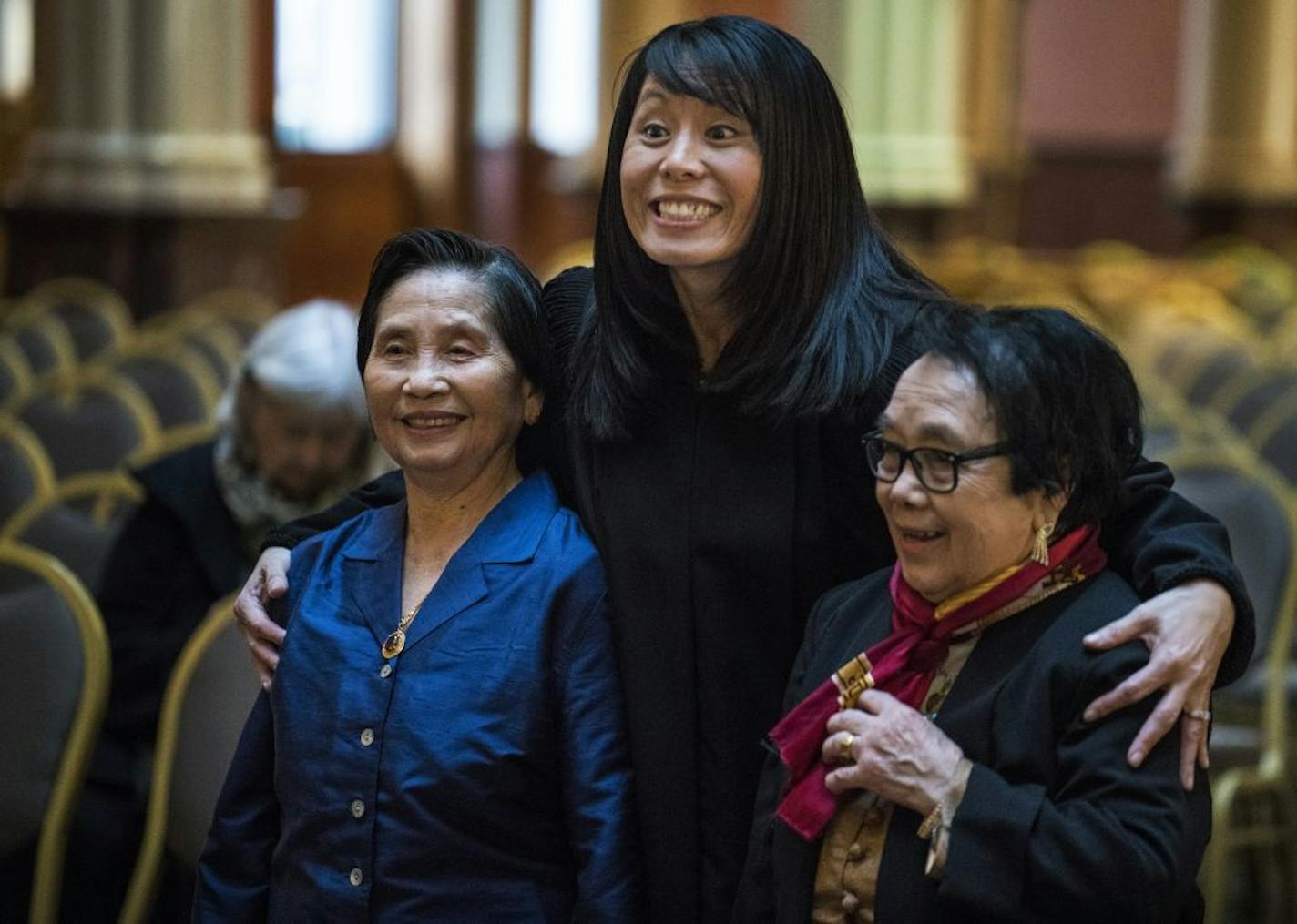 Sophia Vuelo posed for pictures with mother-in-law Li Lo, left, and relative Kia X Lo, right.