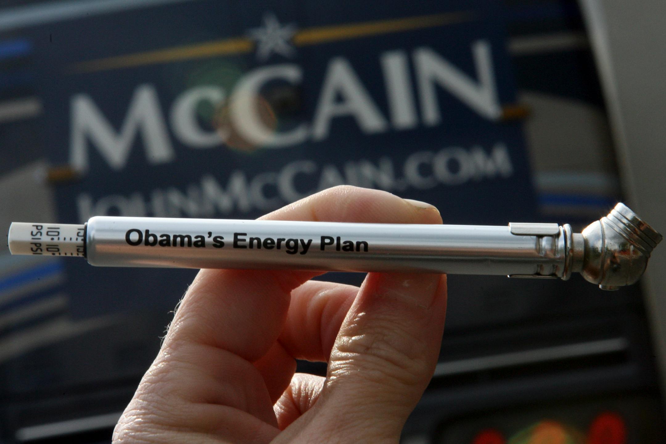 A tire pressure gauge distributed by John McCain's campaign: Rather than researched plans of their own, Republicans offer trivial attacks.