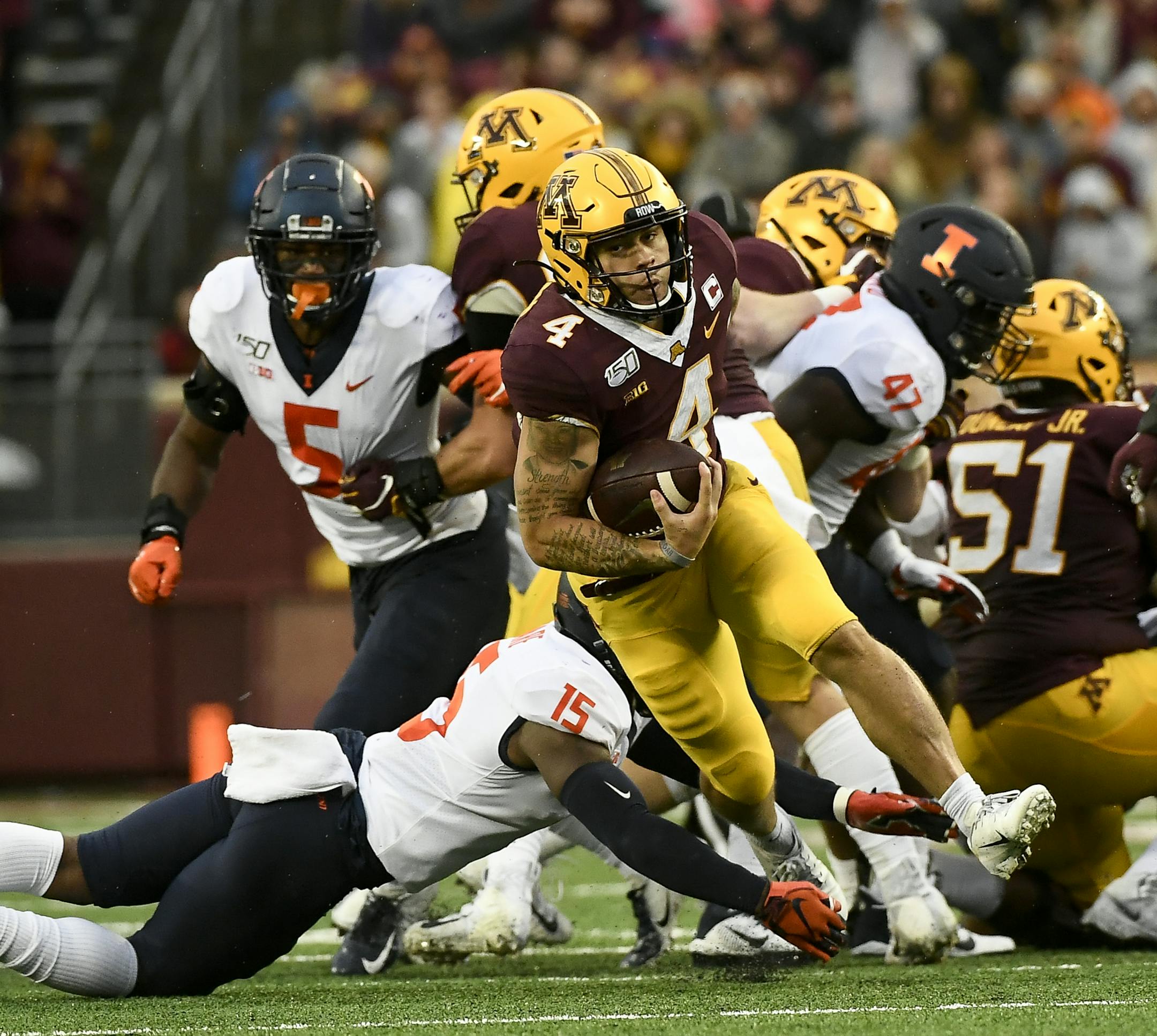 Gophers running back Shannon Brooks (4) rushed the ball in the third quarter Saturday after breaking a tackle by Illinois linebacker Delano Ware (15). ] Aaron Lavinsky &#x2022; aaron.lavinsky@startribune.com The Gophers played the Illinois Fighting Illini on Saturday, Oct. 5, 2019 at TCF Bank Stadium in Minneapolis, Minn.