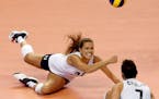 The United States' Kelsey Robinson dove to keep the ball alive against Bulgaria on Saturday during the second of three Olympic qualifying matches in i