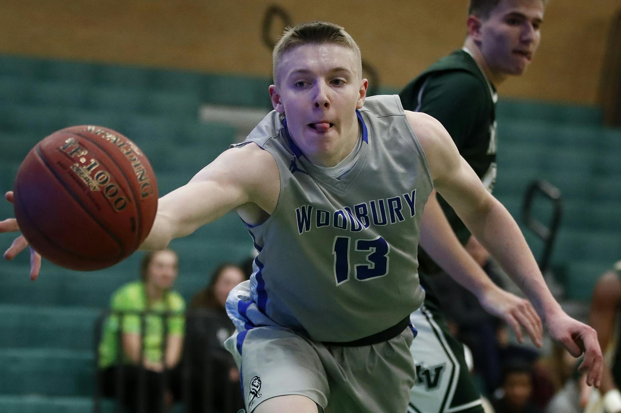 Woodbury senior guard Michael Jones (13) in a game vs. Mounds View. ] CARLOS GONZALEZ &#xef; cgonzalez@startribune.com - Mounds View, MN - January 16 2018 north/east zone sports feature on Woodbury boys' basketball player Michael Jones. Among the metro area's top scorers at about 30 point per game