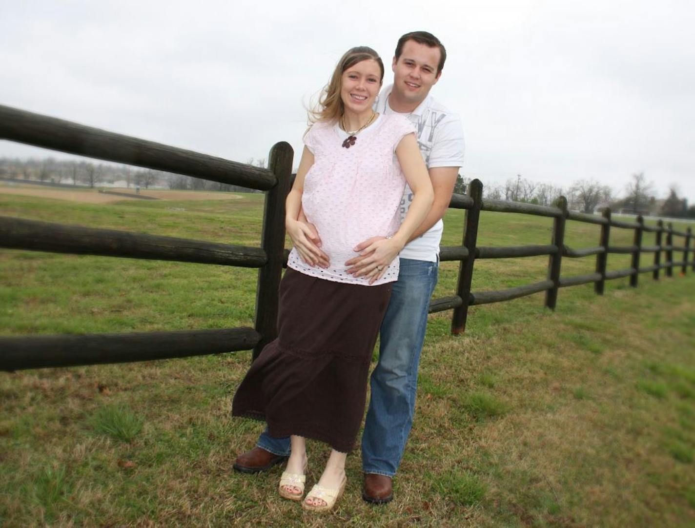 In this image released by TLC, Anna and Josh Duggar pose Friday, April 10, 2009 in Springdale, Ark.