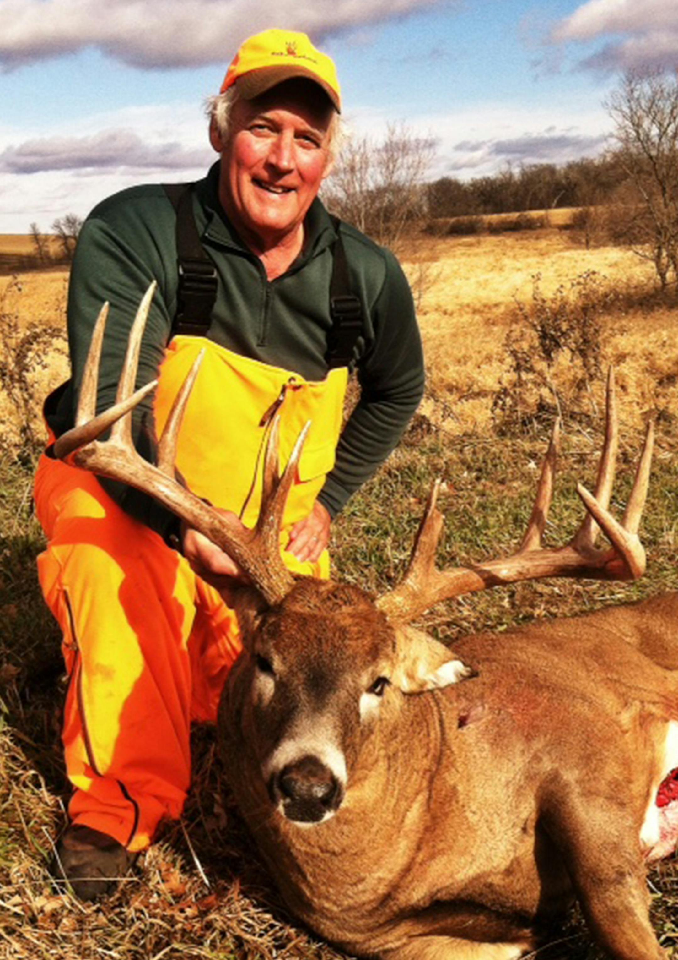 Bill DeCesare of Eau Claire, Wis., with a massive buck he shot near Alexandria, Minn.