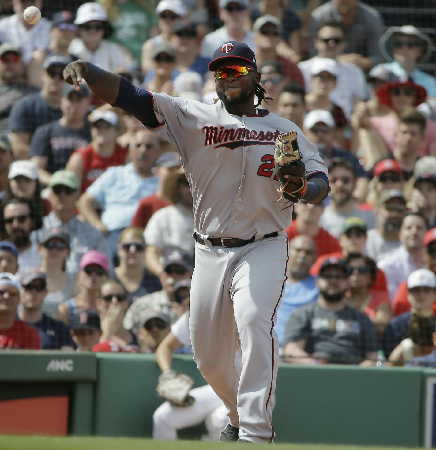 Minnesota Twins' Miguel Sano throws to first base to retire Boston Red Sox's Sandy Leon in the seventh inning of a baseball game, Sunday, July 29, 2018, in Boston. (AP Photo/Steven Senne)