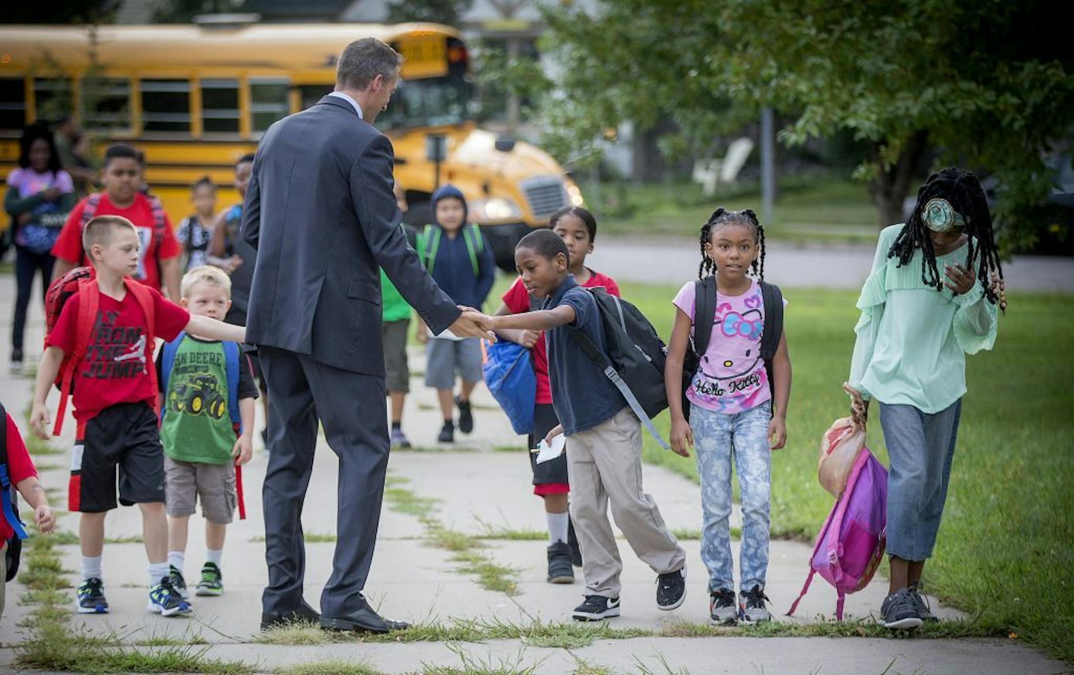 Minneapolis Superintendent Ed Graff greeted students as they made their way into Jenny Lind Elementary School on the first day of school on Aug. 27.