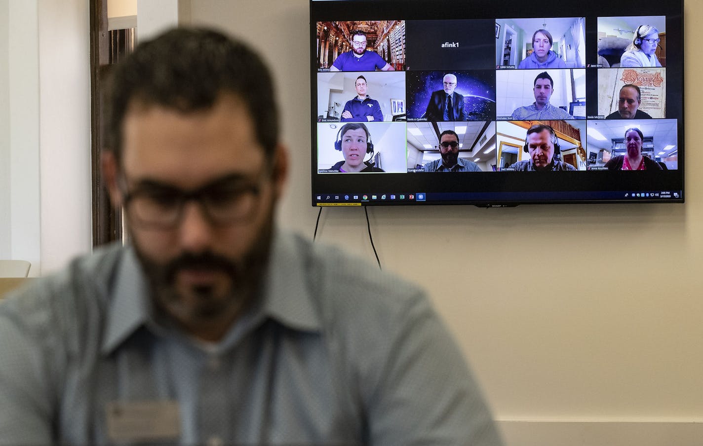 Ryan Sandefer, Associate Vice President for Academic Affairs at The College St. Scholastica, spoke with other faculty members via a ZOOM video call on Tuesday to discuss how classes will be handled online for the rest of the semester. ]
ALEX KORMANN &#x2022; alex.kormann@startribune.com The College of St. Scholastica professors have been preparing for teaching their classes online which has unique challenges for different departments such as science and music.