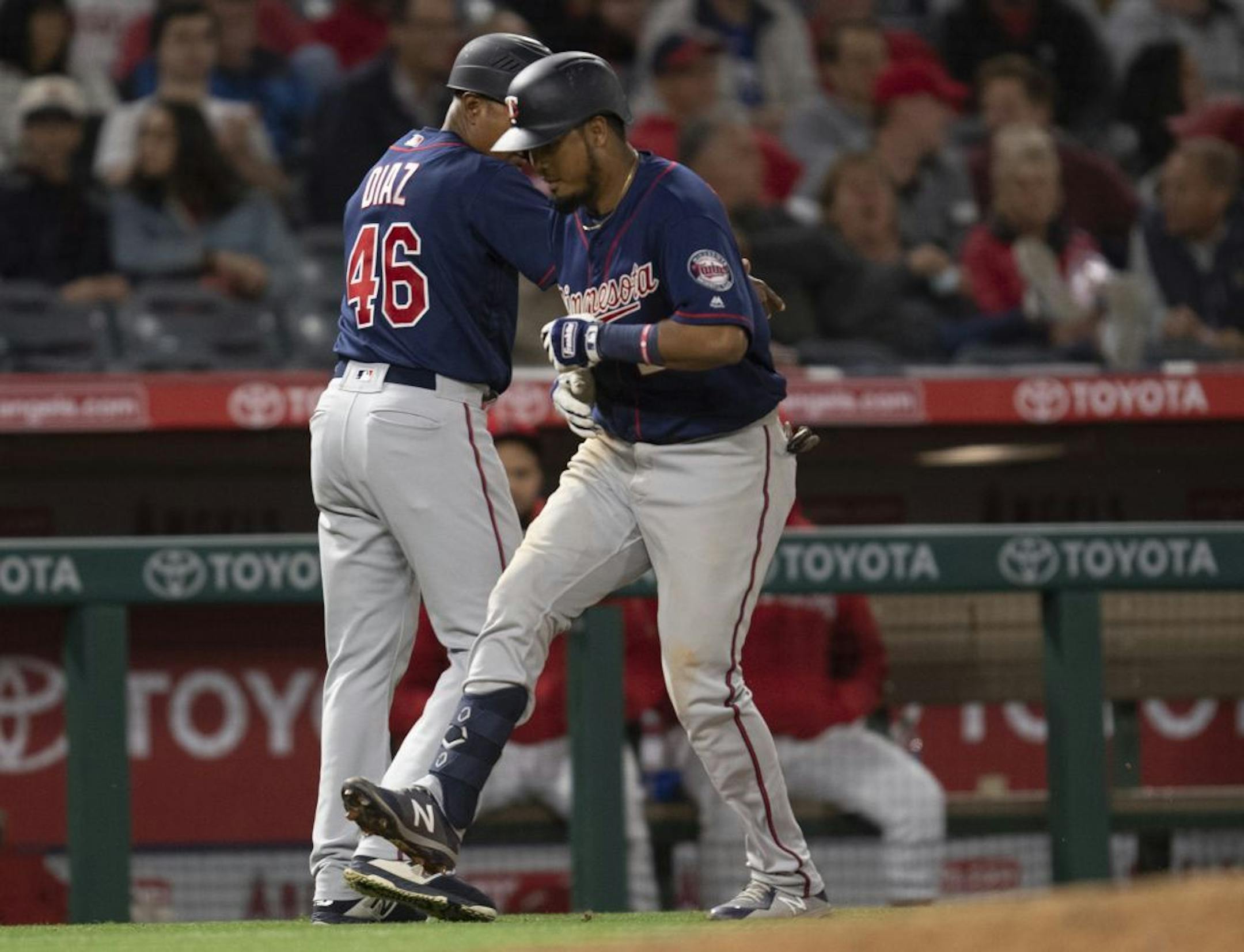 Luis Arraez celebrated his first major league home run with Twins third base coach Tony Diaz on Tuesday.
