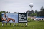 A billboard critical of nickel mining operations is pictured outside of McGregor, Minn., on June 7. Talon Metals Corp. has filed papers with Minnesota